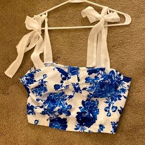 NWOT. Never worn size medium top. Adjustable straps.